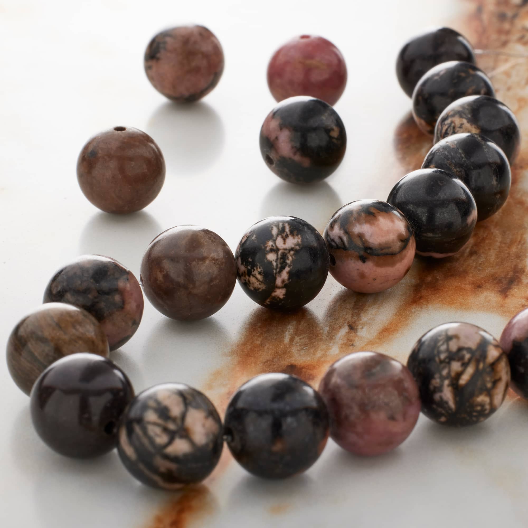 12 Pack: Rhodonite Round Beads by Bead Landing